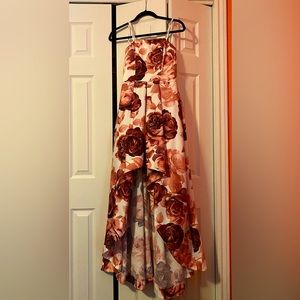 Strapless pink floral dress, above the knee front, long train. Perfect for Prom.